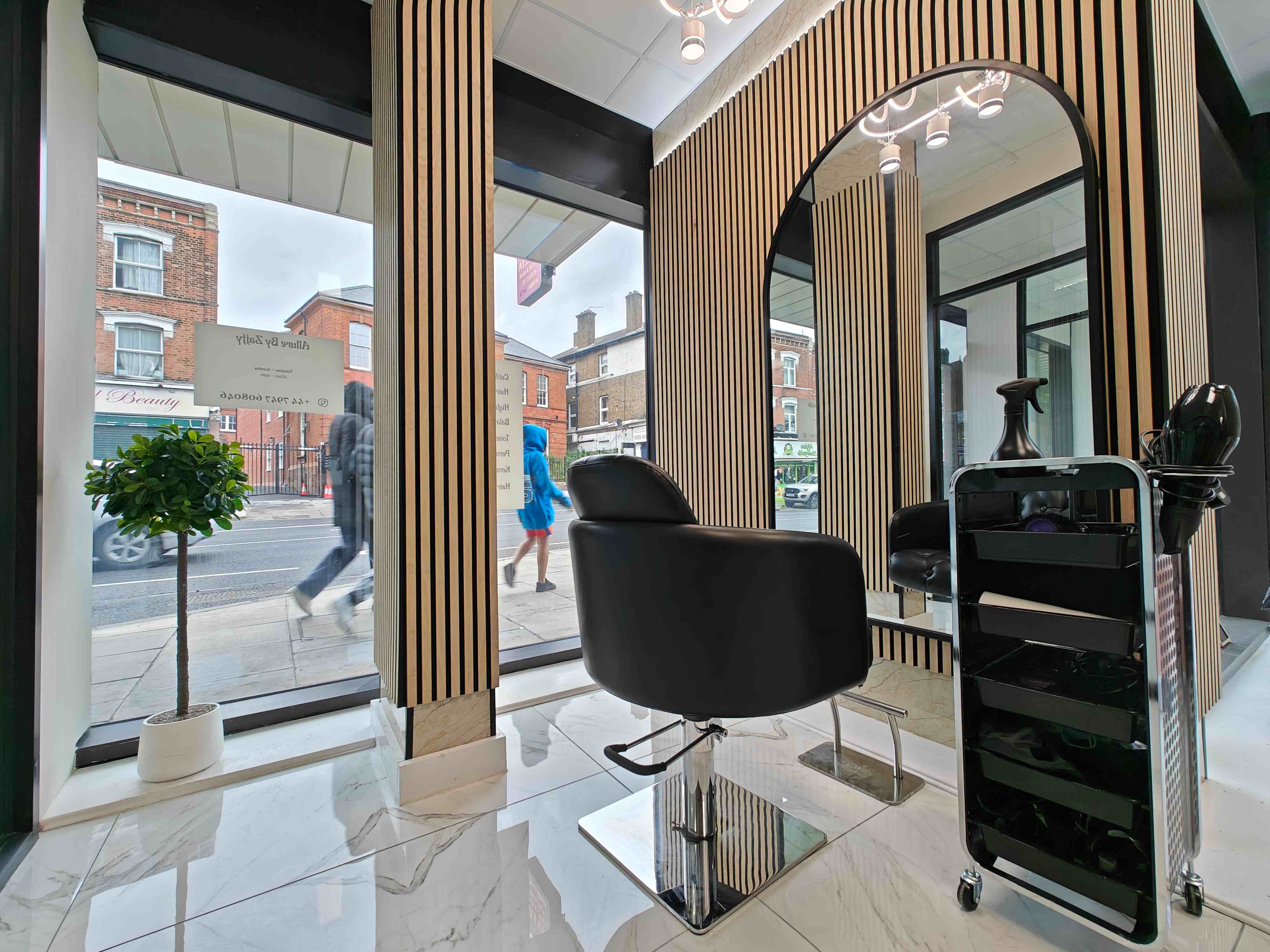 Modern salon styling area with professional chair and contemporary design
